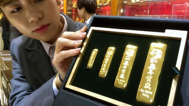 中國(guó)金幣總公司丁酉(雞)年賀歲金條首發(fā)上市