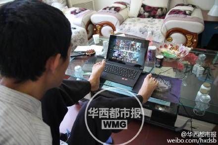 603分無臂考生系網(wǎng)游高手 曾用腳打敗同學(xué)(圖)