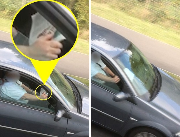 英魯莽司機(jī)交通高峰期被拍到開車時(shí)看報(bào)紙 英魯莽司機(jī)交通高峰期被拍到開車時(shí)看報(bào)紙